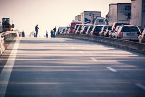 long traffic jam filled with cars on a highway