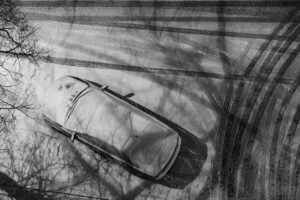 View from the top of a car covered in snow.