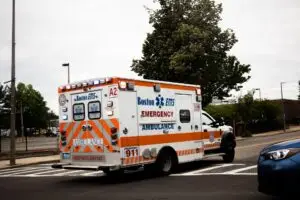 An ambulance driving through the streets of Boston, Massachusetts.