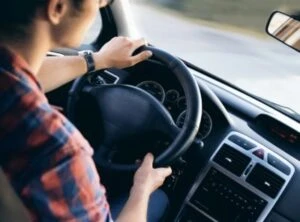 drunk driver behind the wheel of a car