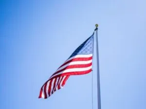 American flag against blue sky