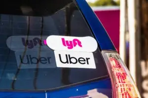 Lyft and Uber stickers on vehicle