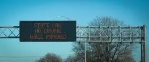 highway sign reminding drivers not to drink and drive