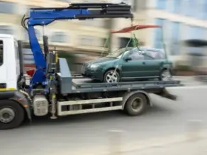 car being towed on a tow truck