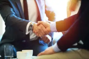 lawyer and client shaking hands