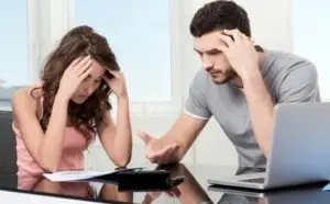 couple stressing over bills
