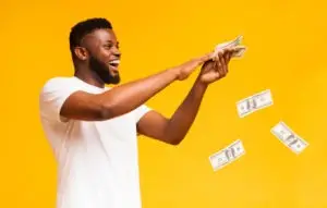 happy young man with money