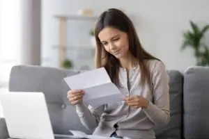 woman looking relieved at loan decision