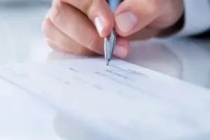 person signing settlement papers