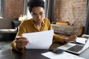 woman paying medical bills online