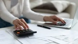 woman calculating her finances