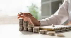 woman stacking coins