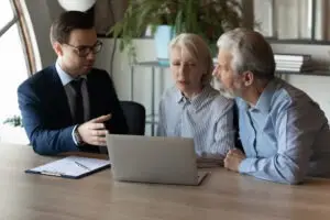 loan officer explaining to california couple how legal funding works