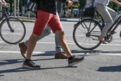 Pedestrians crossing a busy street. In the event of an accident, they can contact a Jacksonville pedestrian accident lawyer.