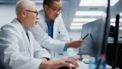 doctors discussing brain scans