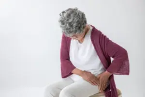 woman with failing hip implant feels pain