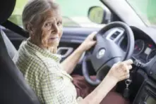 A senior citizen driving