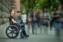 young man sitting in a wheelchair