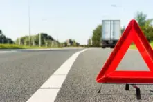 An emergency triangle showing that we handle car accident lawsuits