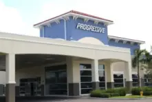 A front view of a Progressive building showing that we handle Progressive insurance claims in Ohio