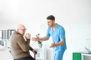 nurse yells at frightened old man