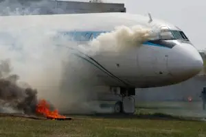 smoke pours out of plane after emergency landing