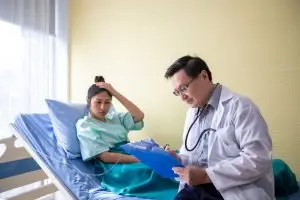 doctor consults patient in hospital