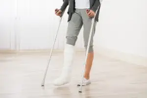 woman in full leg cast