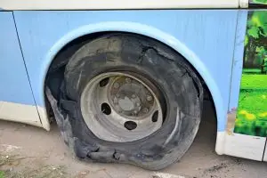 bus with a flat tire