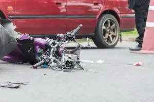 crashed purple motorcycle