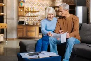 elderly couple learns their benefits application has been approved