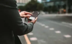 person checking a rideshare app