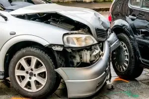 silver car in a crash