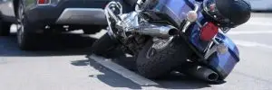 crashed motorcycle and SUV