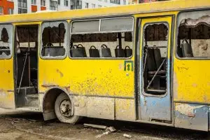 dirty bus with doors missing