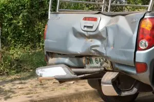 smashed rear of pick-up truck