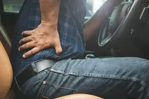 man with back pain after a car accident
