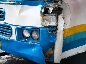smashed side of a bus