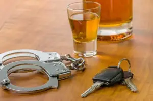 car keys handcuffs and drinks