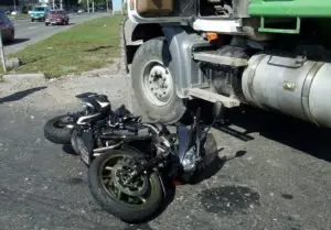 motorbike and big truck crash
