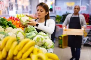 young-woman-working-in-a-grocery-store