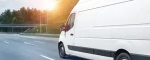 delivery truck racing down the road