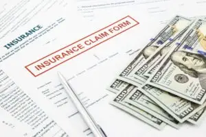 insurance claim form with money