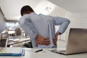man-with-back-pain-in-the-office