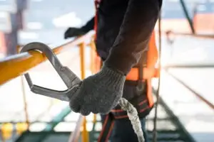 construction worker wearing safety harness