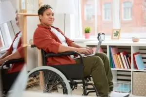 black woman in wheelchair with disabilities