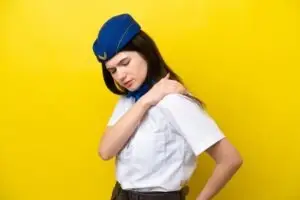 Georgia flight attendant holds shoulder after workplace injury