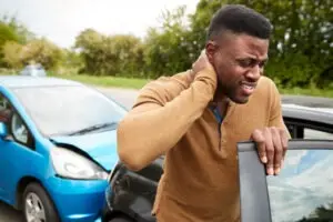 A sore motorist experiencing pain after an auto accident is normal until the injury has healed.