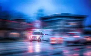 An ambulance speeds. What happens if an ambulance hits you?