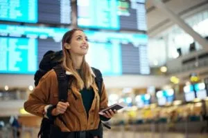 A woman at the airport wonders how to file an airport injury claim.